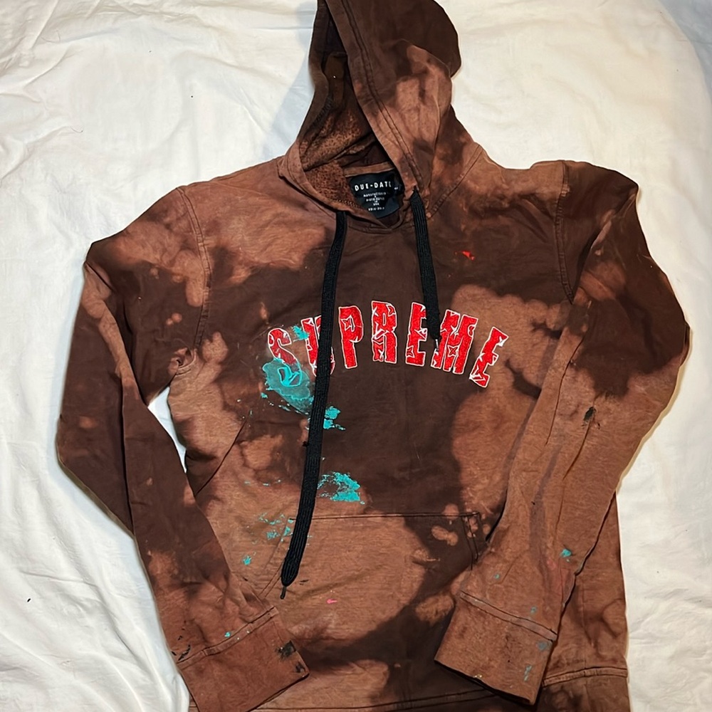 Supreme and Louis Vuitton with artist paint